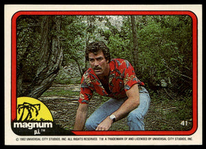 1983 Donruss Magnum P.I. #41 (squatting in woods)