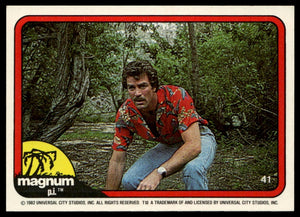 1983 Donruss Magnum P.I. #41 (squatting in woods)