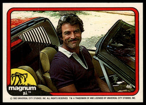 1983 Donruss Magnum P.I. #46 (sitting in driver's seat, smiling, purple shirt)