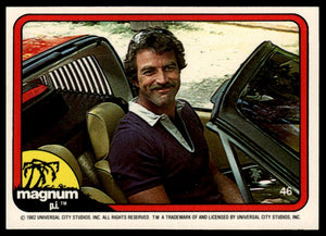 1983 Donruss Magnum P.I. #46 (sitting in driver's seat, smiling, purple shirt)