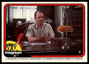 1983 Donruss Magnum P.I. #8 Exhausted, I flopped in a chair at Higgins' desk.