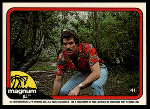 1983 Donruss Magnum P.I. #41 (squatting in woods)